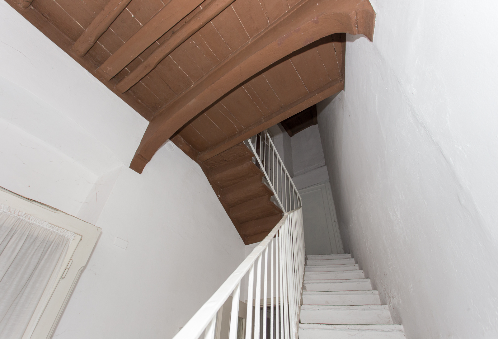 Stairwell — upper landing Before